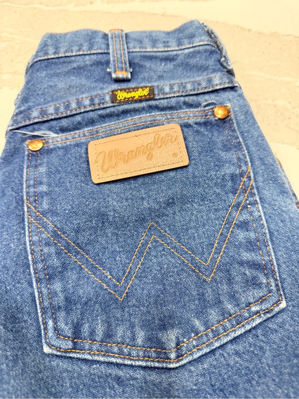 Wrangler Men's Medium Blue Straight Jeans with Tan Patch